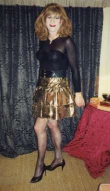 My gold mini-skirt and black see-through body