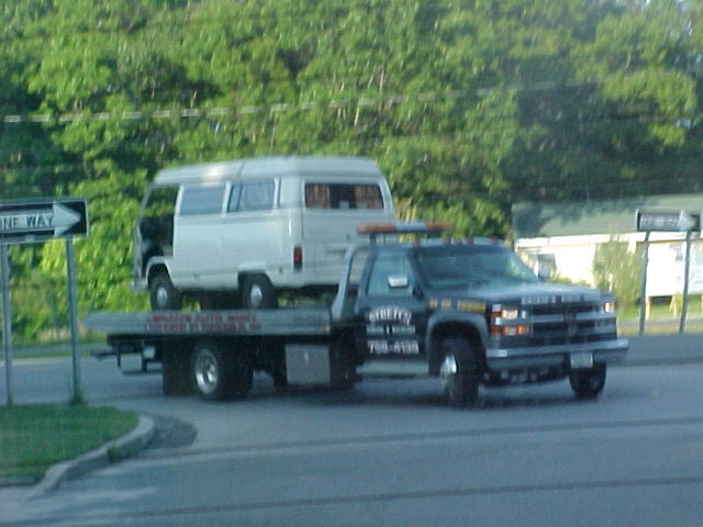 Turning onto our road on the flatbed.