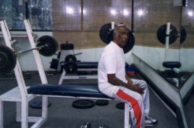 Singapore National Coach Resting In Between Sets of Bench Press