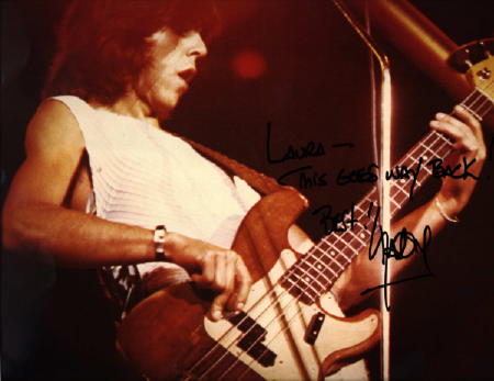 Kasim signed this: Laura - This goes way back Best! Kasim