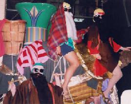 JOSEPH AND THE AMAZING TECHNICOLOR DREAMCOAT - Seminole Players/Spotlight Dinner Theatre - 1996 (In drag as an Ishmaelite with a camel in the wings - On camel: Ellie and Darlene, on the floor with whip: me)