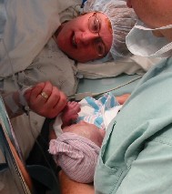 Mommy admiring Abigail in the OR