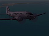 Image of Douglas R4D-6 NATS v4.0 over Wotje at dawn. Click for larger image.