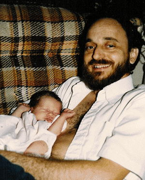 New born Christy and daddy.