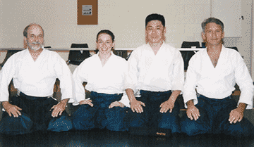 Christy, Jae-sang, John and Daryl after their black belt testing