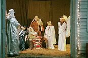 wrapped in swadling cloths laying in a manger...
