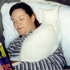 Kisa using my mom as a bed