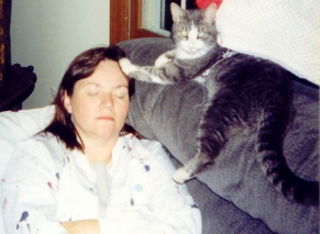 Morgue with his paw on my mom's head