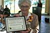 Picture of Charlotte Lenarsic--Bowler of YesterYear holding plaque.