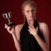 Picture of lady holding trophy