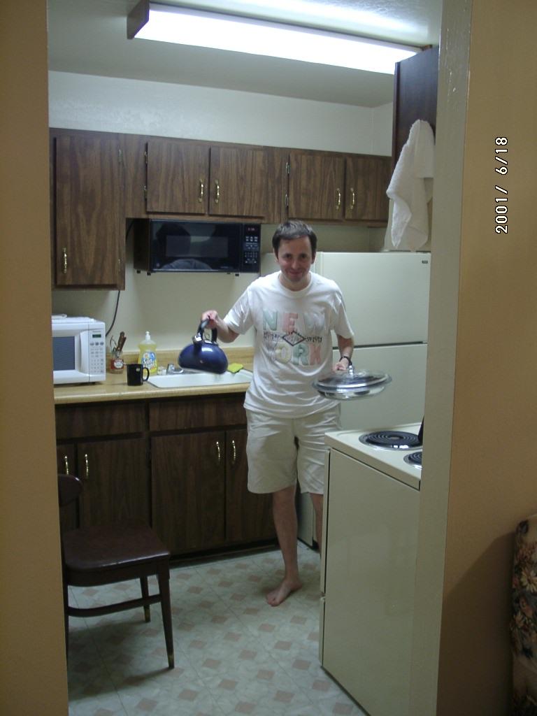 [Me at kitchen, June 18, 2001]
