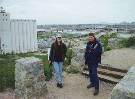 Chris and Neta stand in front of the Mill and Salt River Bridges