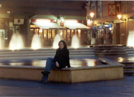 Kate by the fountain in Birmingham City Centre freezing her butt off