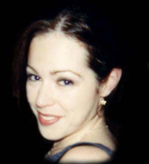 A tipsy Kate coyly grins...