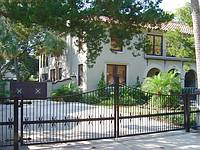Ironically, a fence and gate have been added to the Stanford home