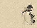 Crowe on a couch in cream.
