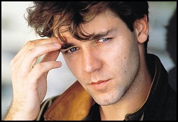 Adult-sized hands on a young Crowe.