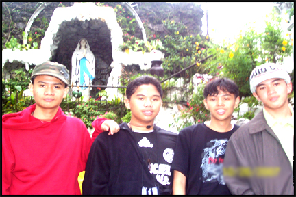 at the Lourdes groto with colas, totit and carl