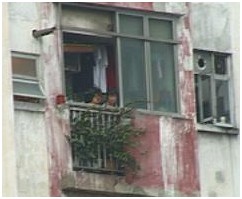Children Looking Down on the Crowds