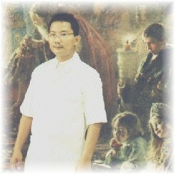 Subagiyo with the Makowsky's painting background