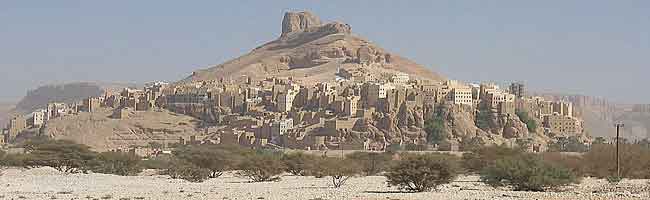 Village of Al-Hajarin on the feet of volcanic rock on the way from  Sayun to Al_Mukalla