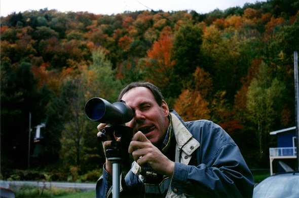Sylvain try to focus on a moving bird near Fitch Bay, October 2001
