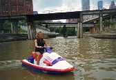 Karen jet skiing through downtown Houston