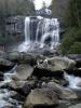 The falls from the river up  close