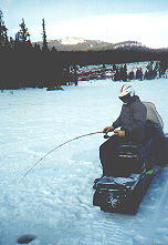 Fishing from Snowmobile