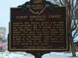 The sign for the oldest paved street in the U.S.