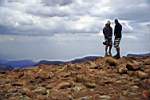 Roly and I stand on Lesotho and Southern Africa's highest point after getting there the hard way