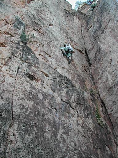 Stacy climbing at Shelf Road on some bolted 5.10 called 'Suburbia'