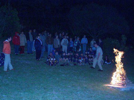 "Panther" getting everybody involved at the campfire.