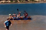 Kudu Patrol victoriously crossing the finish line after a grueling 2.5 hours of strenuous paddling.