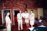 Mr Pike (Area Commissioner) presents Aidan Berry (right) and Daryl Whittal with their Springbok Award certificates