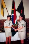 Daryl Whittal (left) and Aidan Berry hold up a cake decorated with the emblem of the Springbok badge