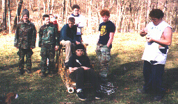troop 476 strikes a pose while
the dog eyes Cliff's dinner!