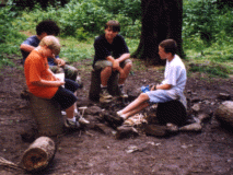 Trying to start a fire by talking
to the sticks (mind over matter...)