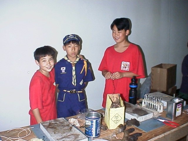 American and Korean scouts learning handy crafts