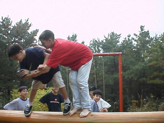 Who can stay on the log?