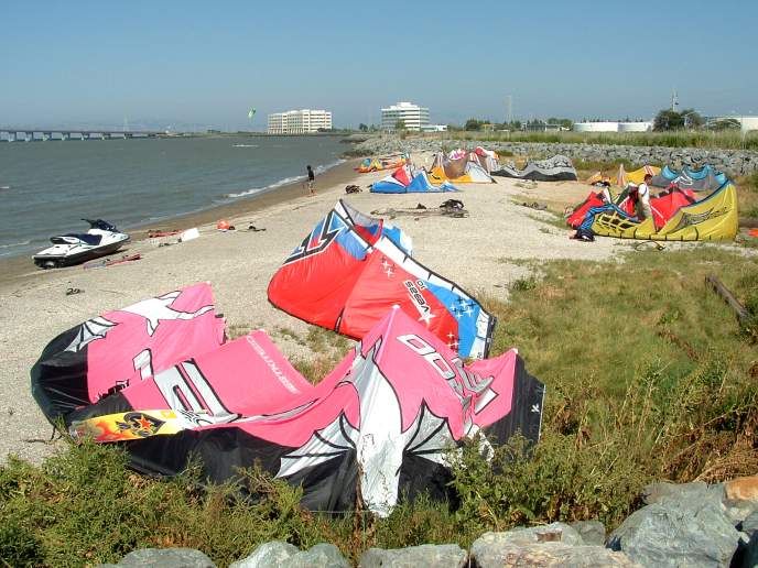 Kiteboarders on beach near Foster City