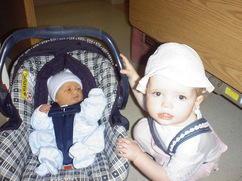 Don't touch my car seat Lucy! March 2002