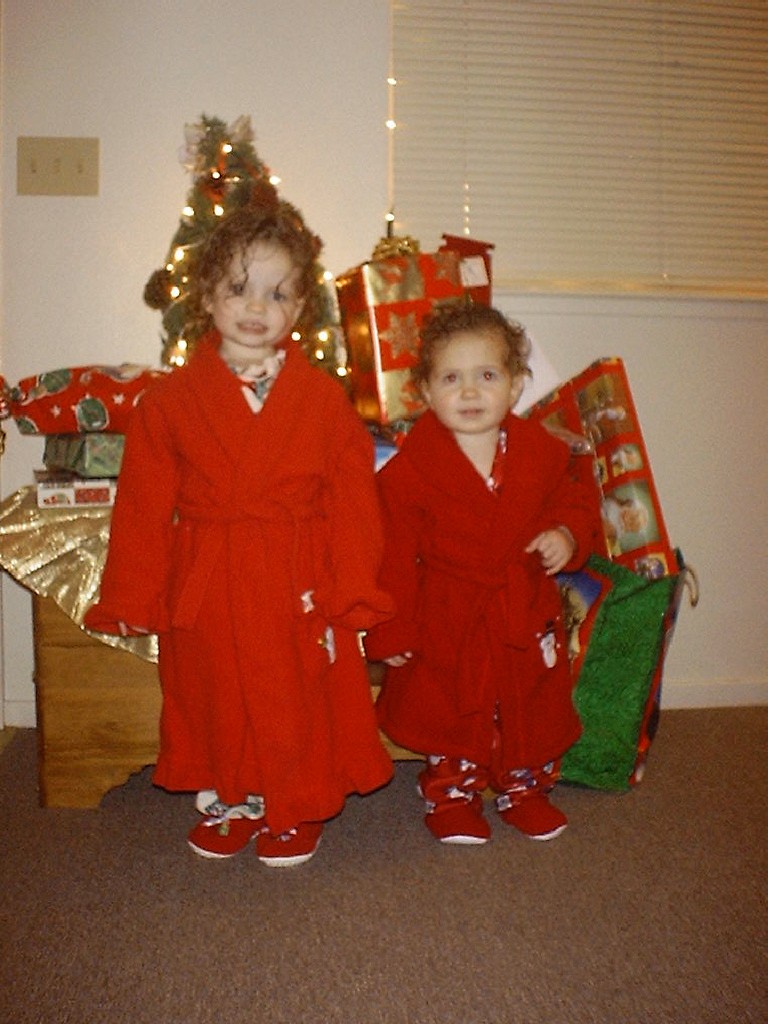 Lucy and Cole in new Christmas pajamas. December 2003