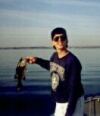 Taz on sandy pond in NY(biggest small mouth bass i've caught)