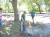 Scouts lighting a fire - one running away