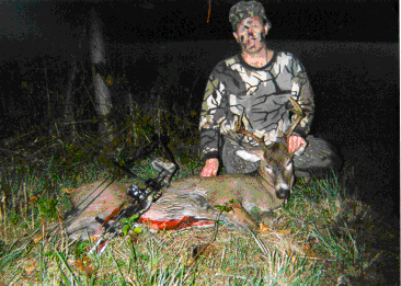 Hank Beard with a nice 8-point bow kill