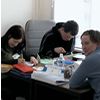 Photo of reporting team at work