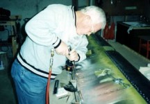 Dad Drilling Holes for Trim Tab Attachment