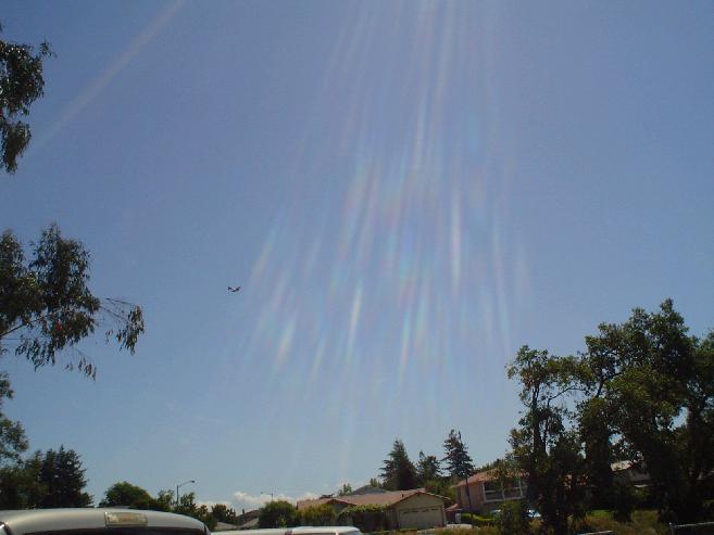 There was this B-17 flying around the other day, and I tried to take a picture of it. Didn't turn out so well, but what the heck.