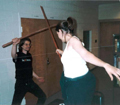 Bart parries Emily's attack